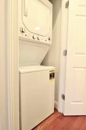 a view of a utility room with washer and dryer