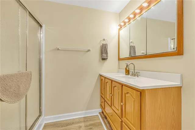 a bathroom with a sink and a mirror