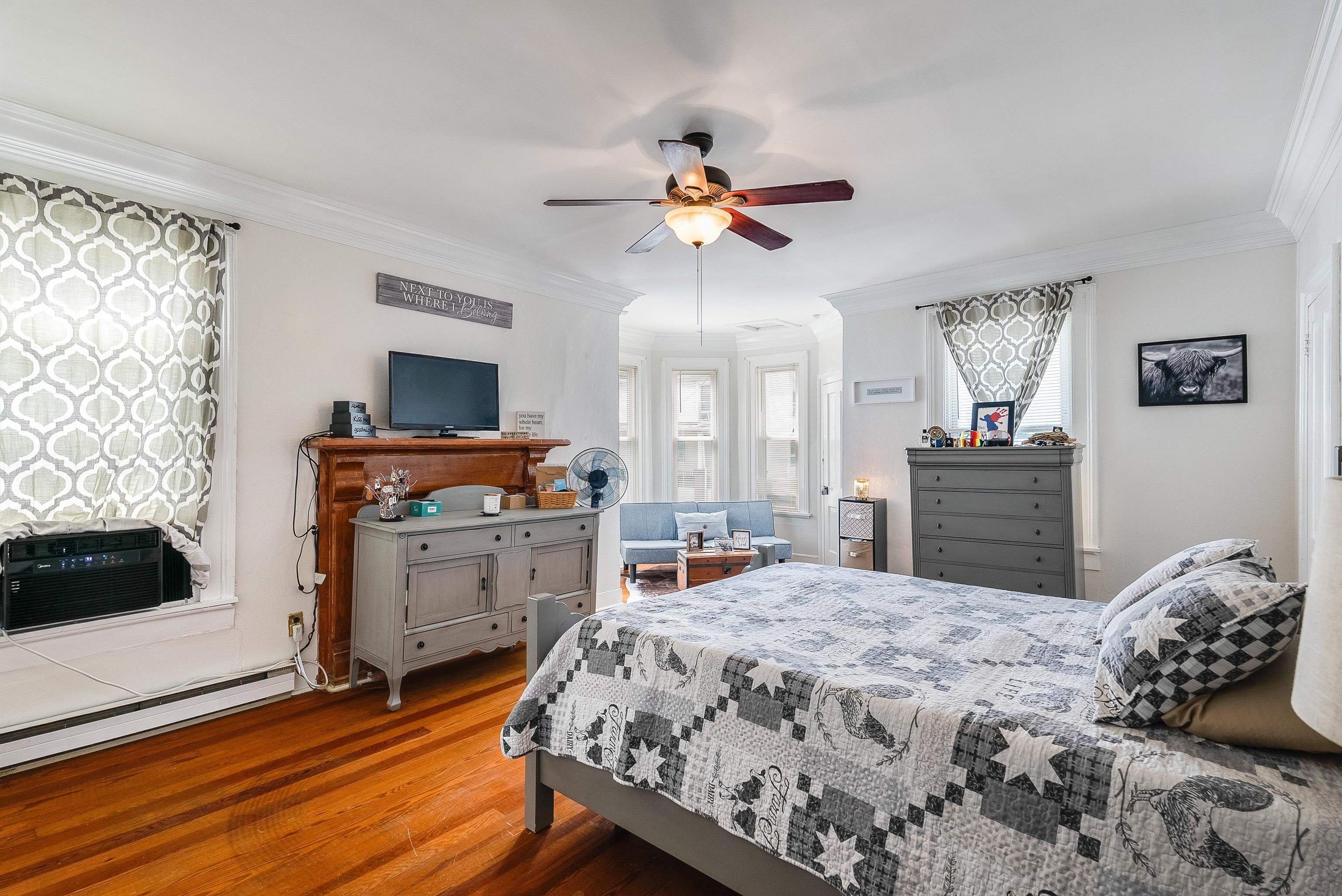 76 Main Street Greenville, VA 24440 - Photo 27 of 50 a bedroom with a bed and a flat screen tv