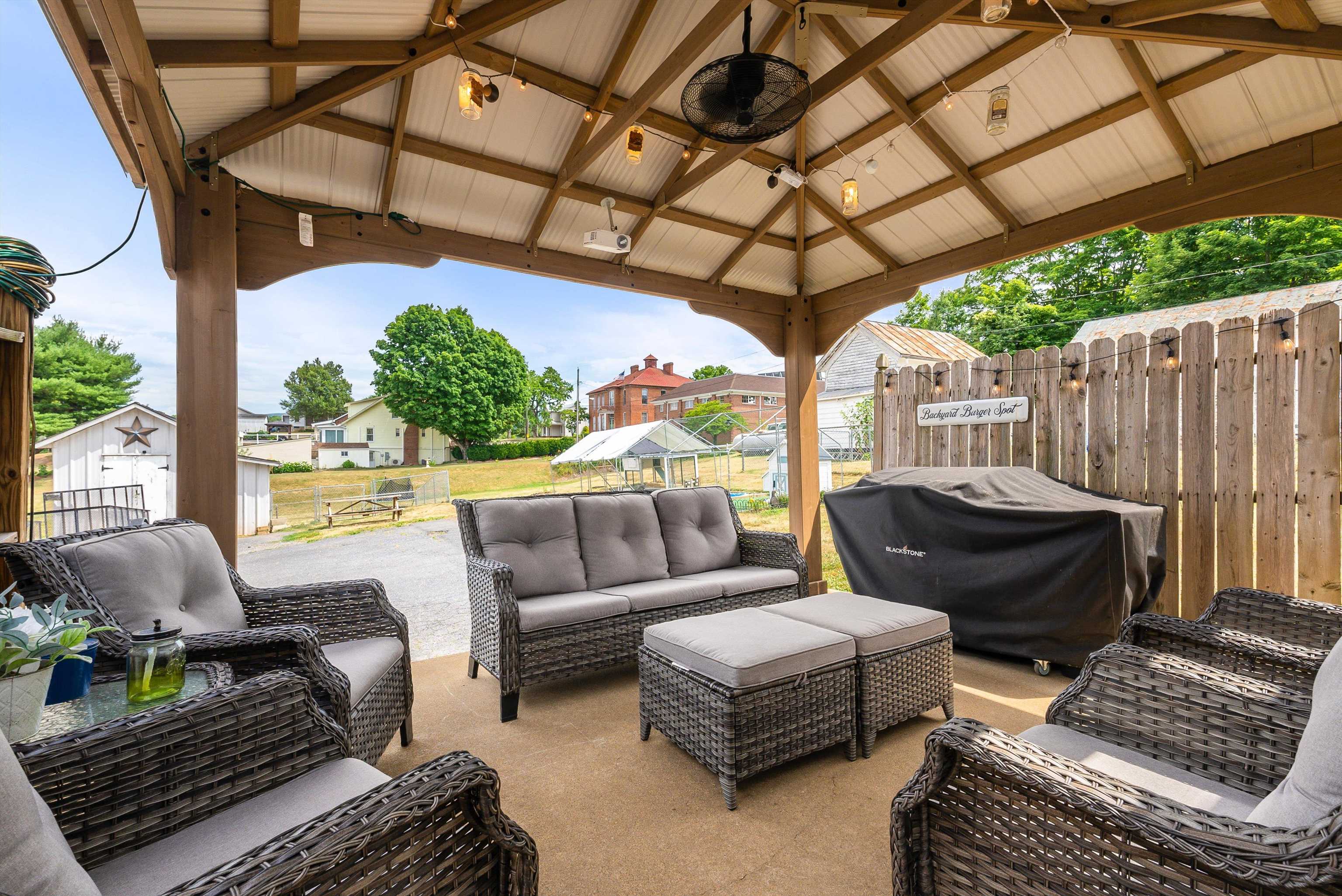 76 Main Street Greenville, VA 24440 - Photo 35 of 50 a outdoor living space with patio furniture and a potted plant
