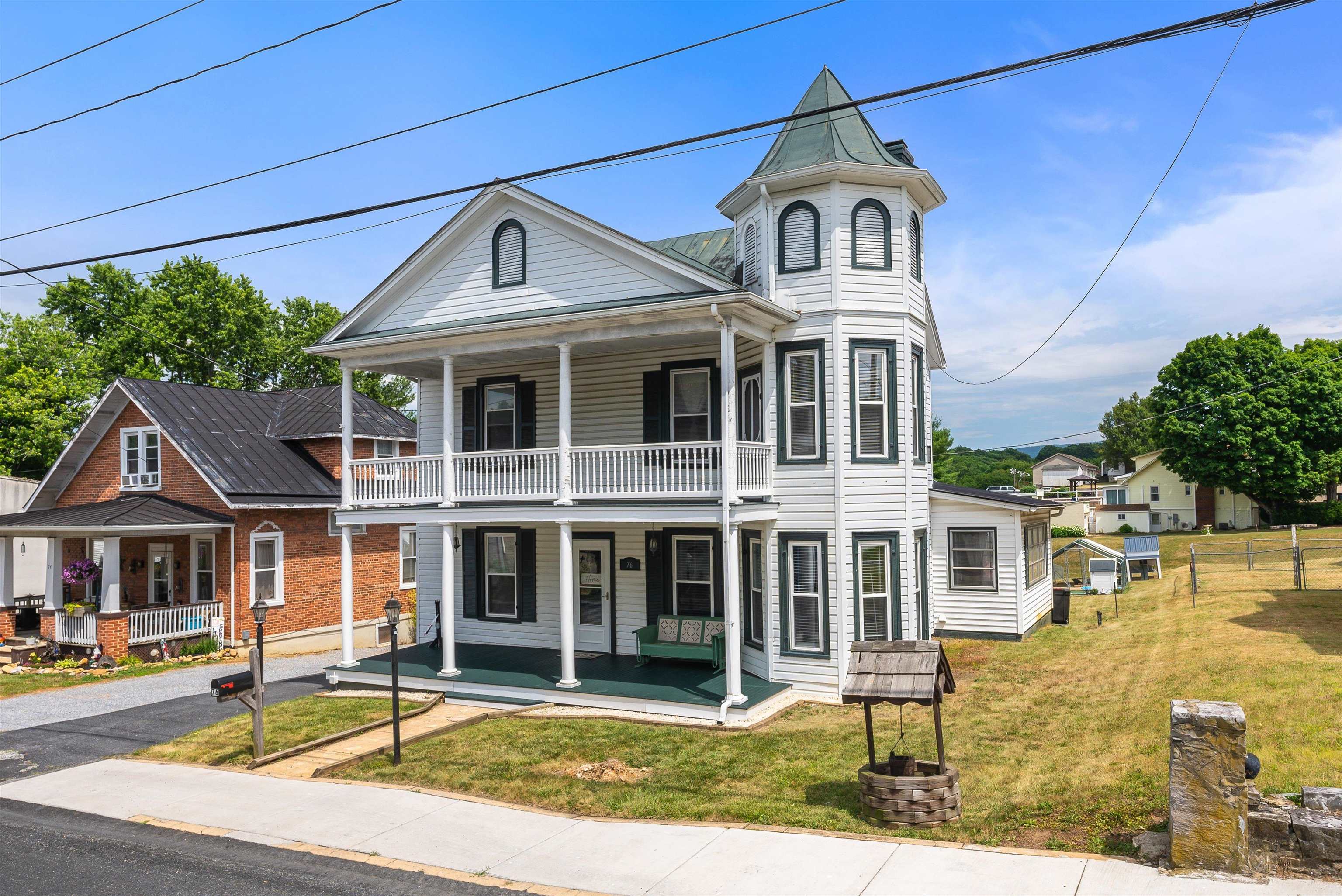 76 Main Street Greenville, VA 24440 - Photo 4 of 50 a front view of a house with a yard