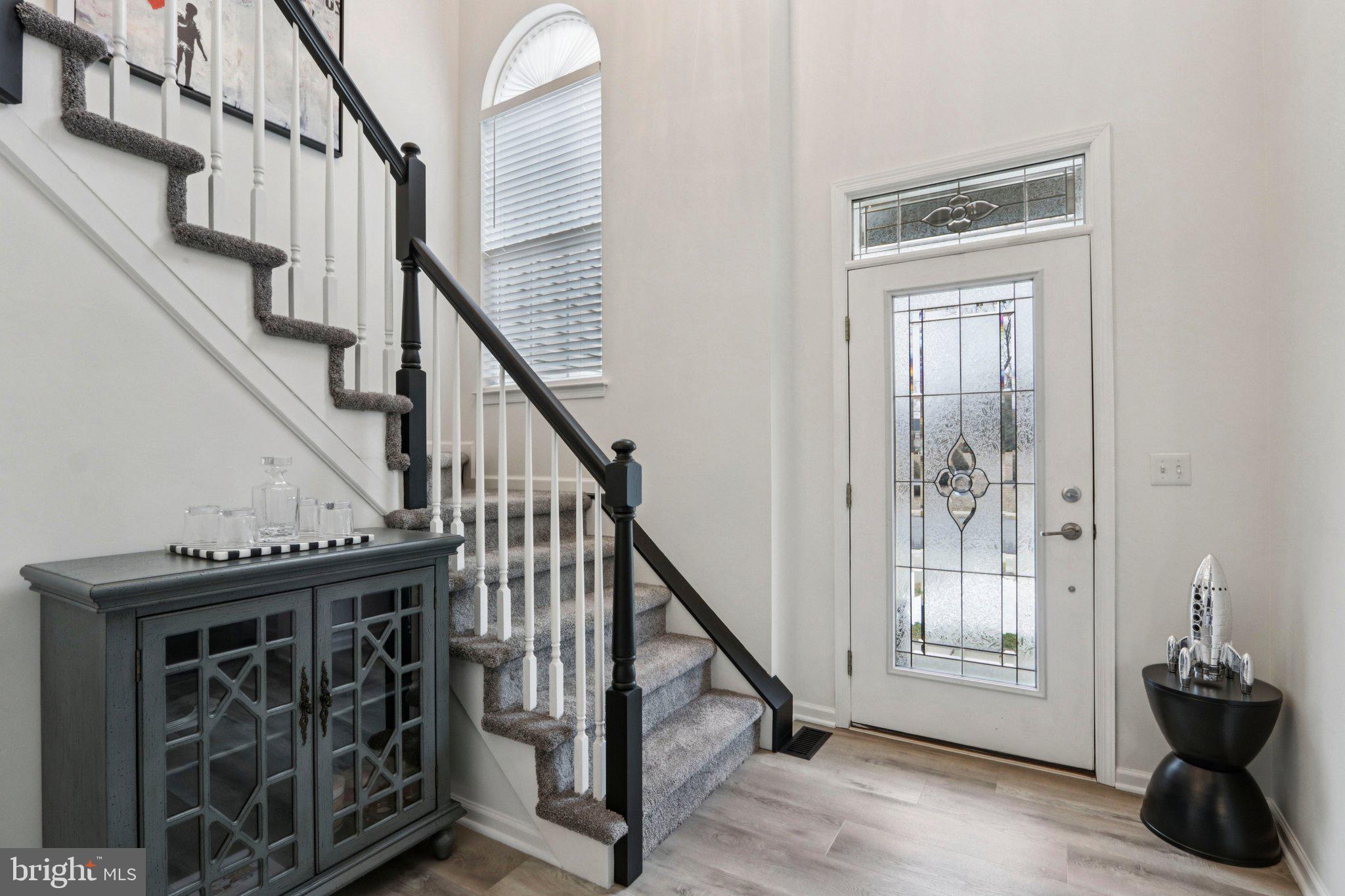 1 John's Way Bridgeton, NJ 08302 - Photo 18 of 57 a view of entryway with wooden floor and stairs