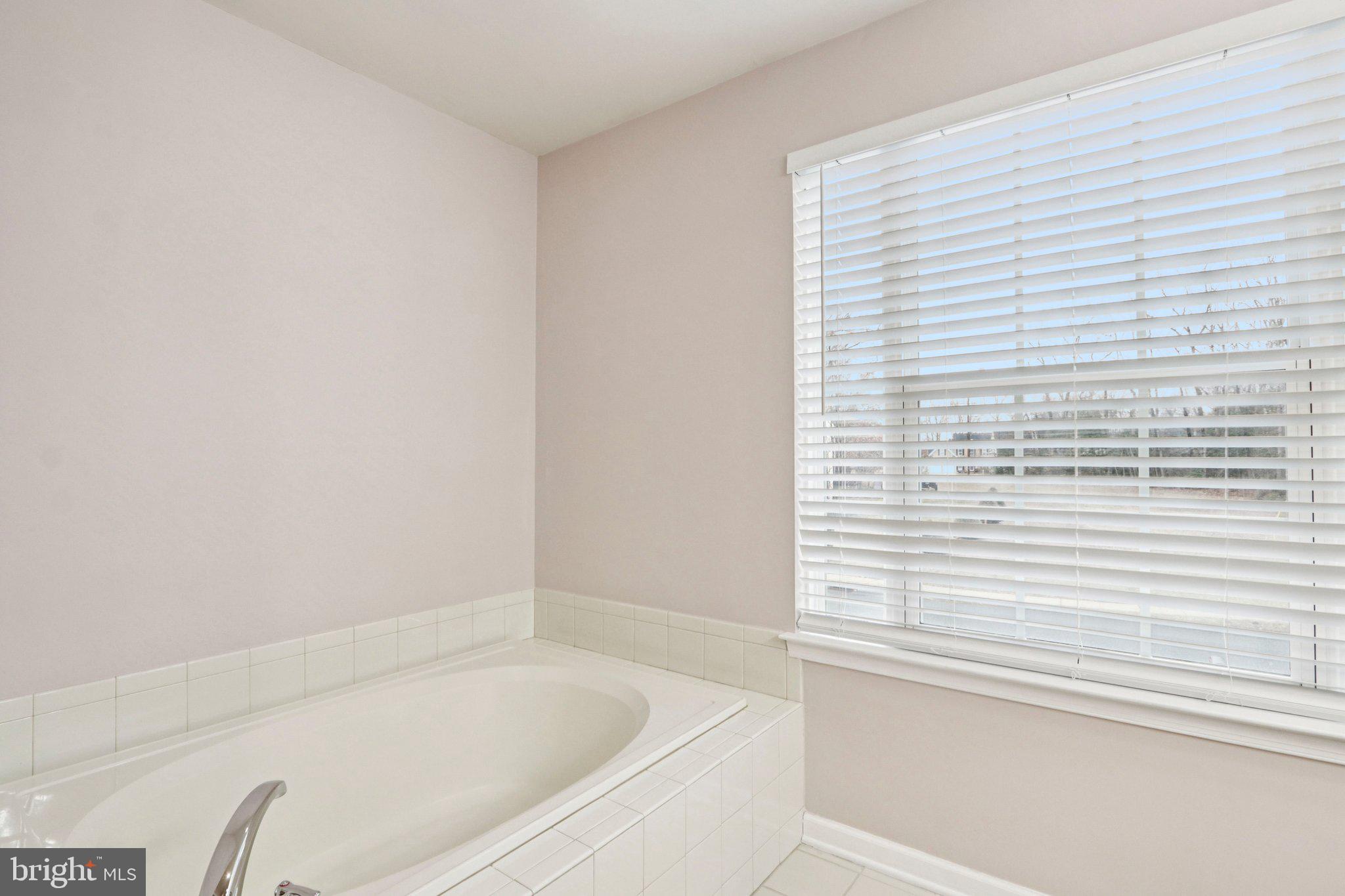 1 John's Way Bridgeton, NJ 08302 - Photo 44 of 57 a bathroom with a bathtub and a shower