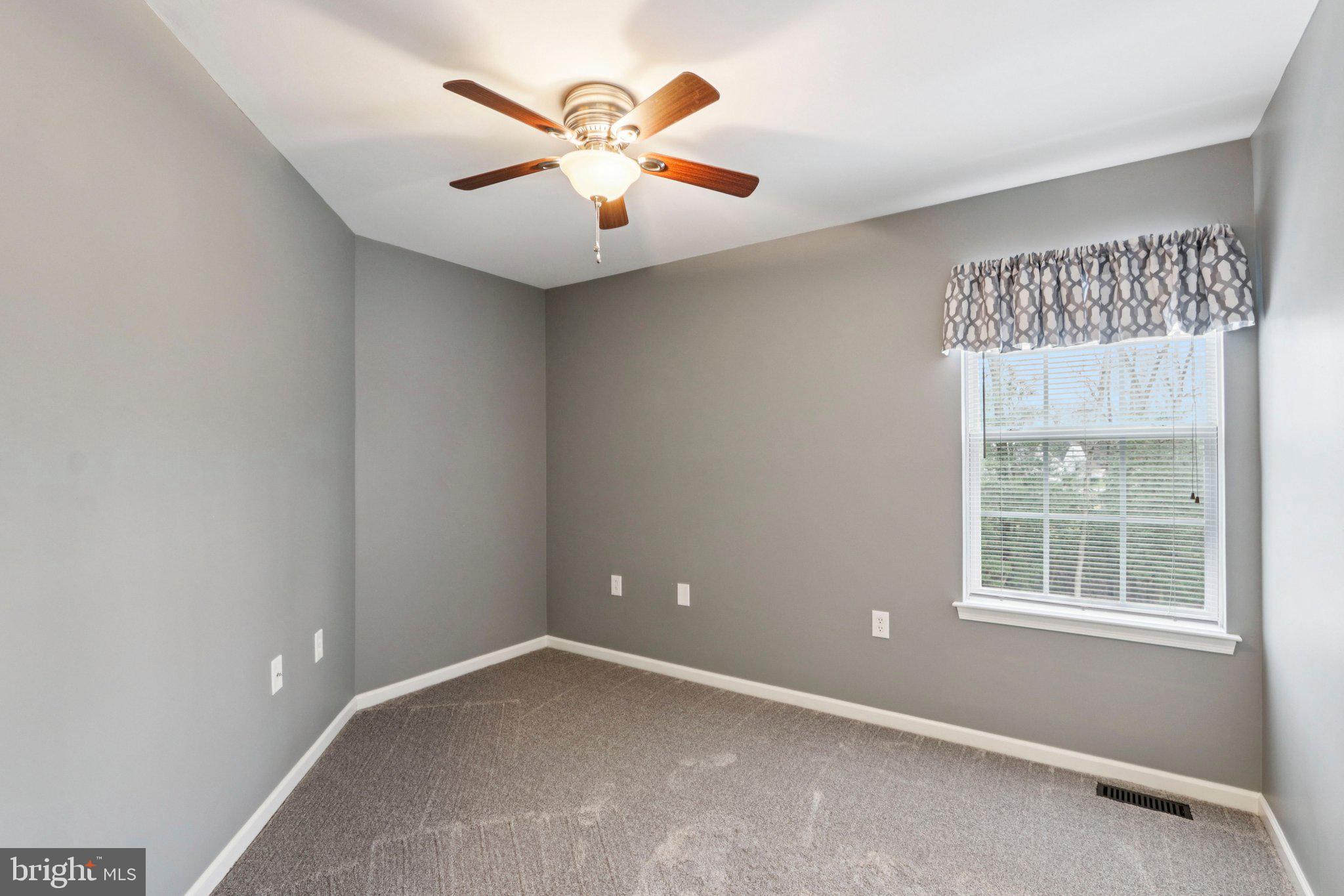 1 John's Way Bridgeton, NJ 08302 - Photo 46 of 57 an empty room with windows and fan