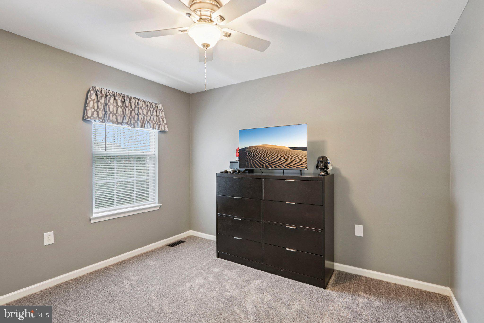 1 John's Way Bridgeton, NJ 08302 - Photo 48 of 57 a room with a dresser and a window