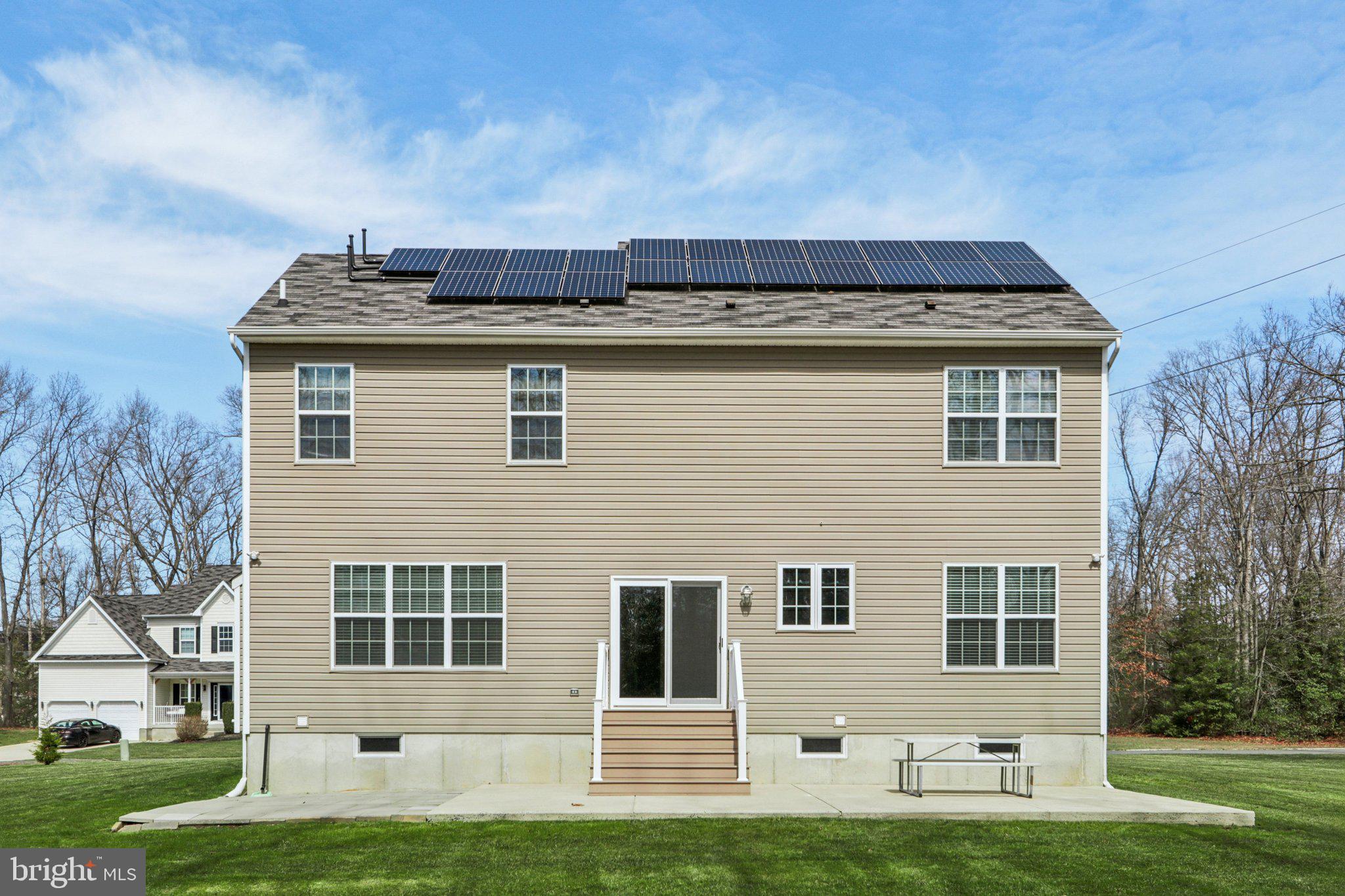 1 John's Way Bridgeton, NJ 08302 - Photo 5 of 57 a front view of a house with a yard
