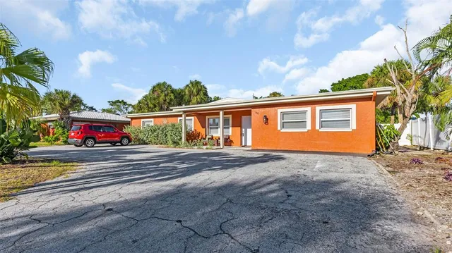 a view of a house with a street