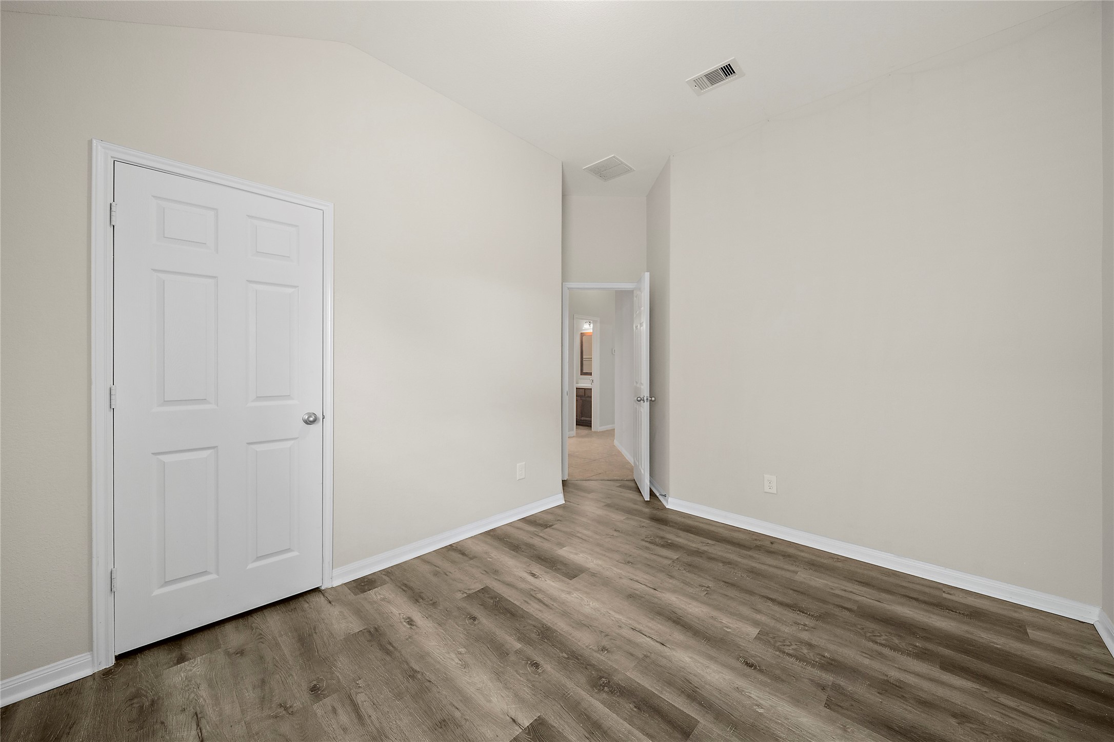 20215 Towering Cypress Drive Cypress, TX 77433 - Photo 24 of 27 a view of an empty room with wooden floor