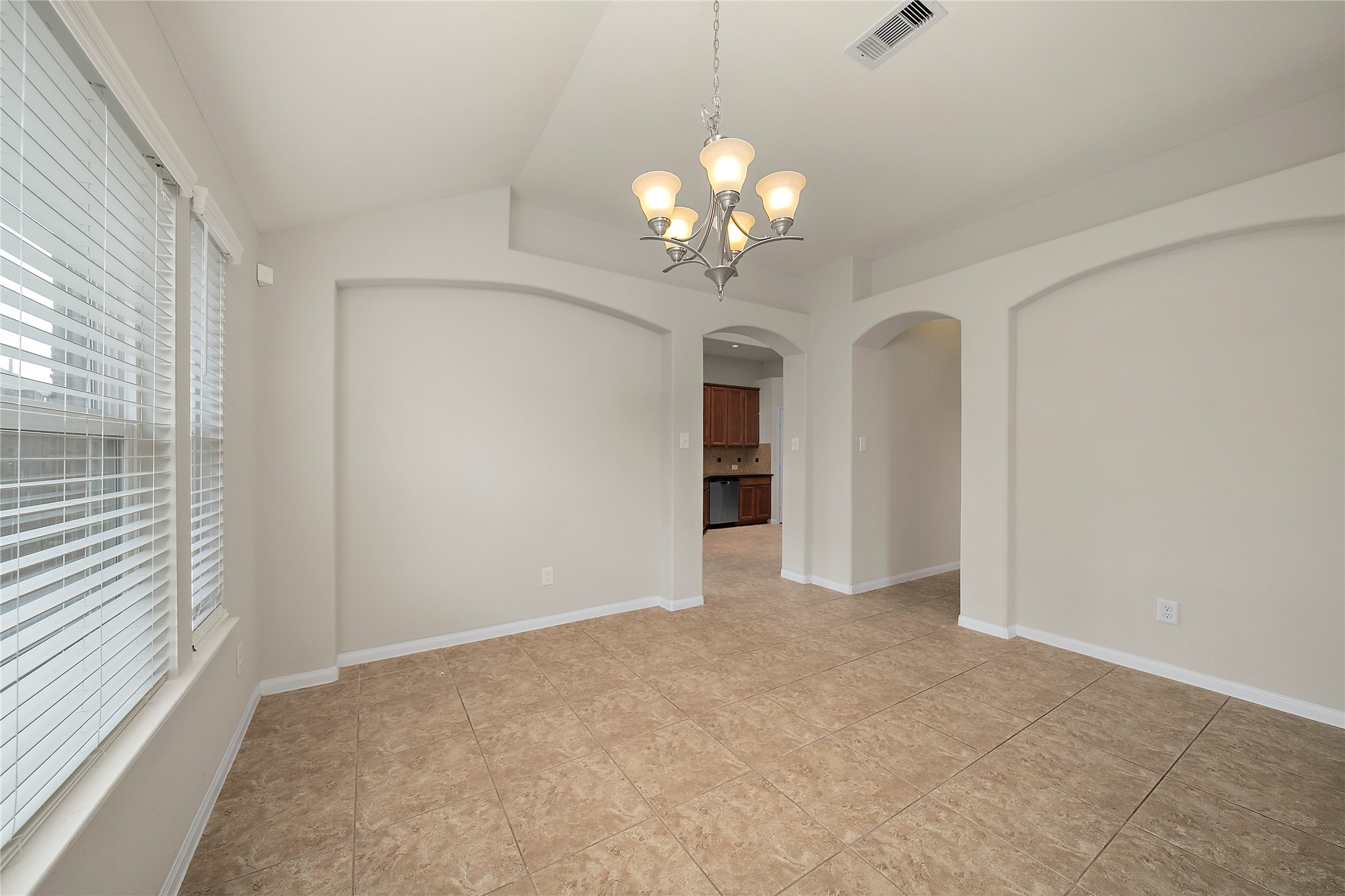 20215 Towering Cypress Drive Cypress, TX 77433 - Photo 4 of 27 wooden floor in an empty room with a window