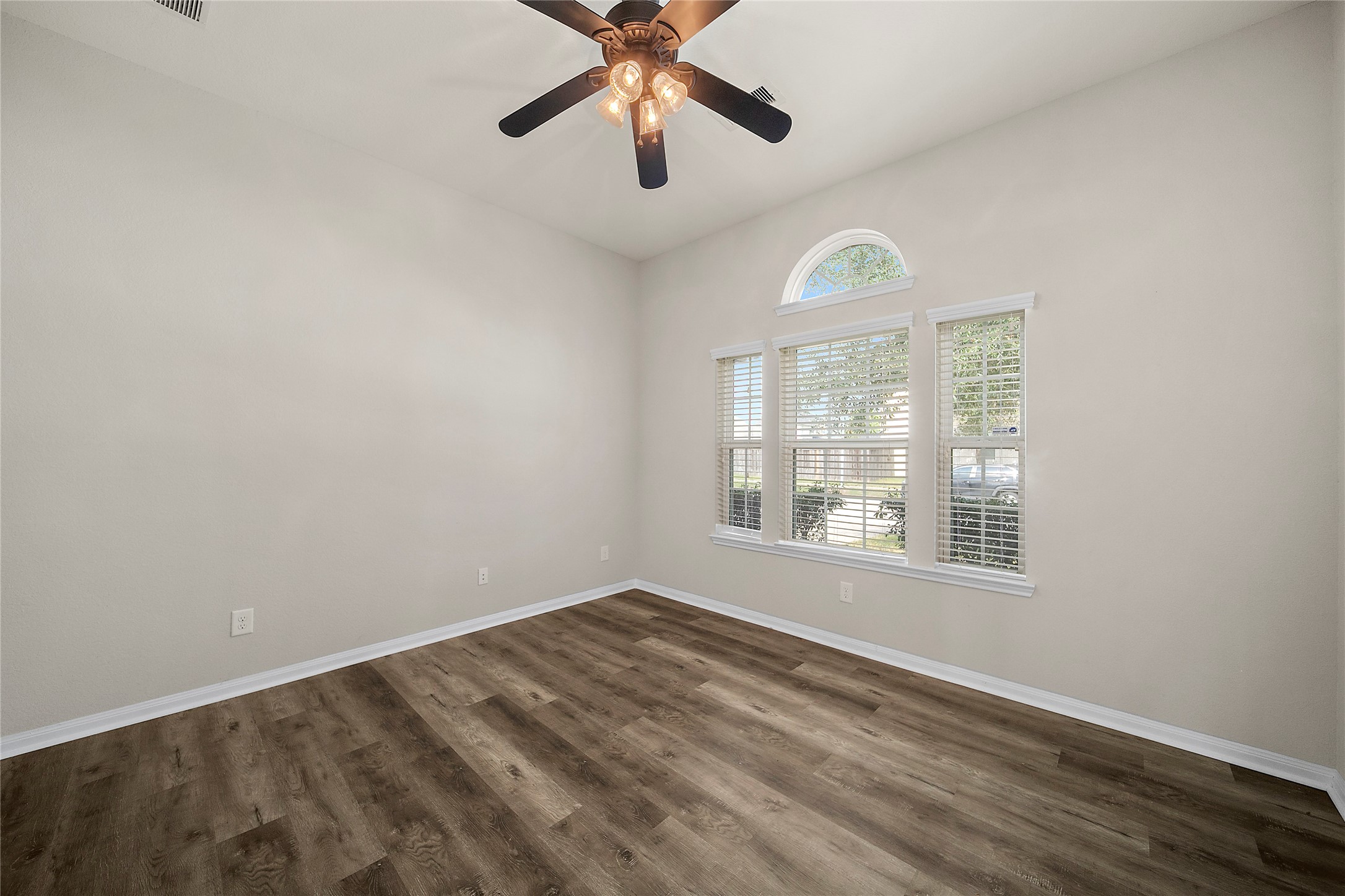 20215 Towering Cypress Drive Cypress, TX 77433 - Photo 6 of 27 a view of an empty room with a window