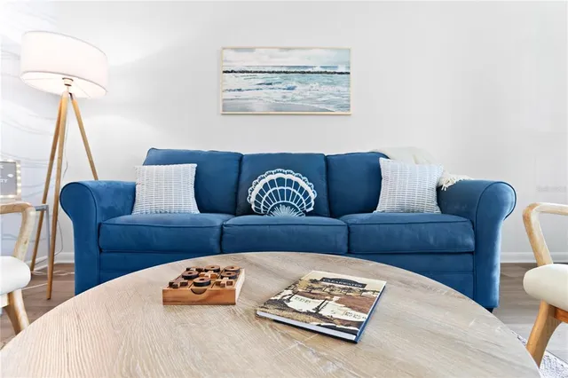 a kitchen with a refrigerator and a sink