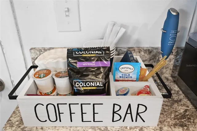 a view of a potted plant with wooden floor