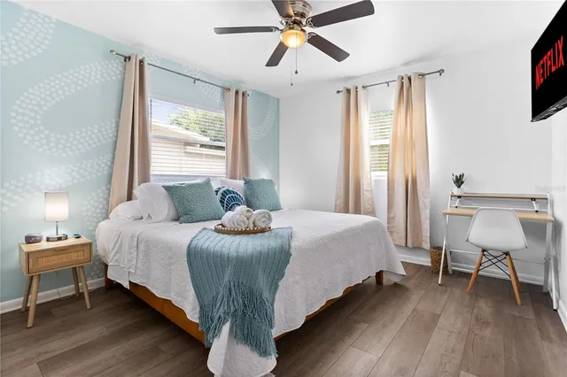 a bathroom with a sink and glass door