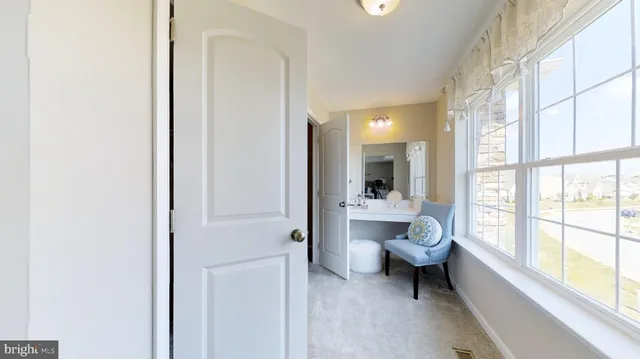 a bathroom with a bathtub shower and toilet