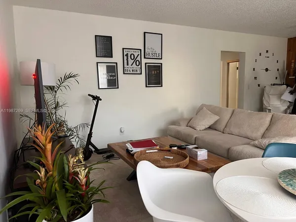 a living room with furniture and a couch