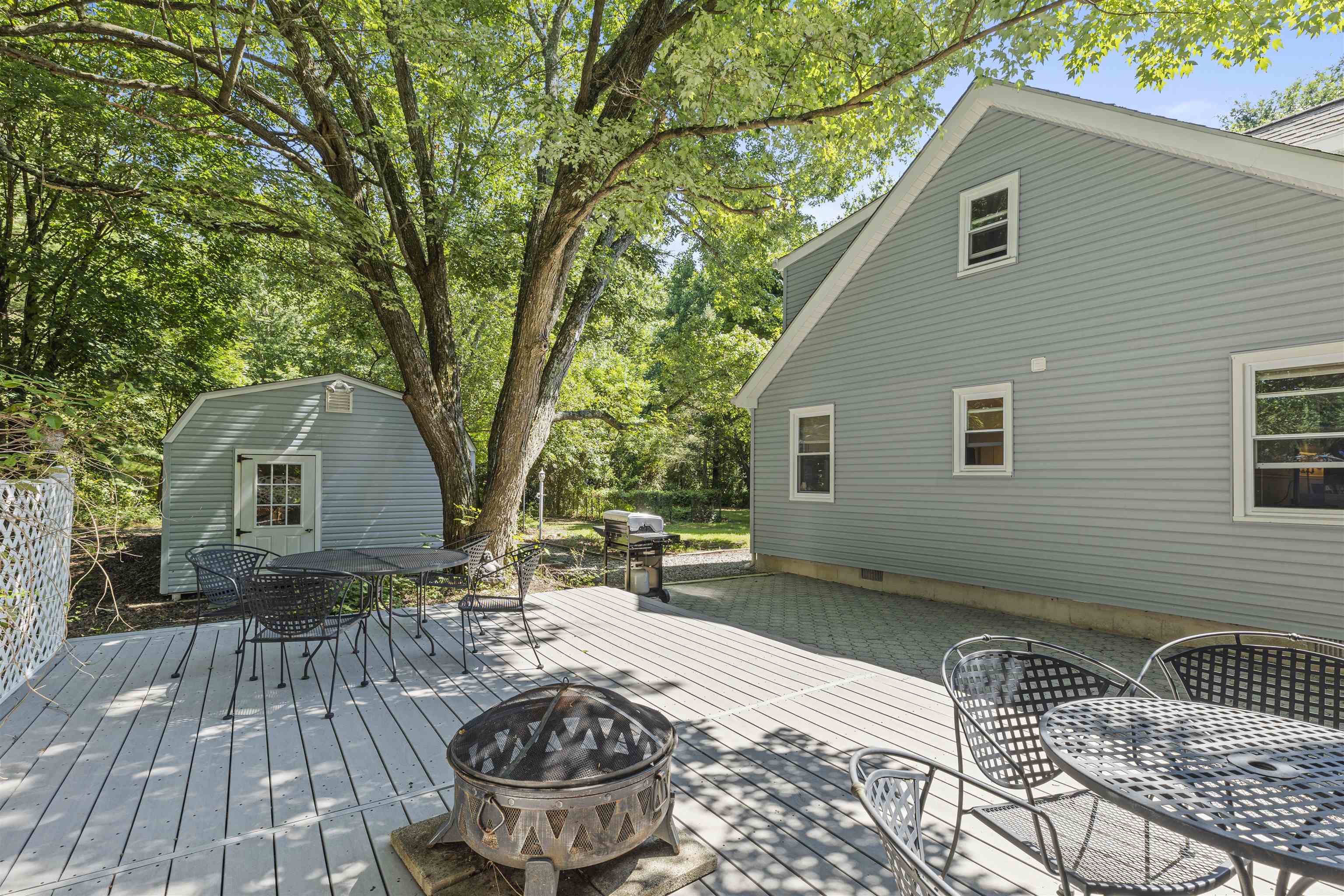 271 Hands Mill Road Belleplain, NJ 08270 - Photo 40 of 50 a backyard of a house with table and chairs