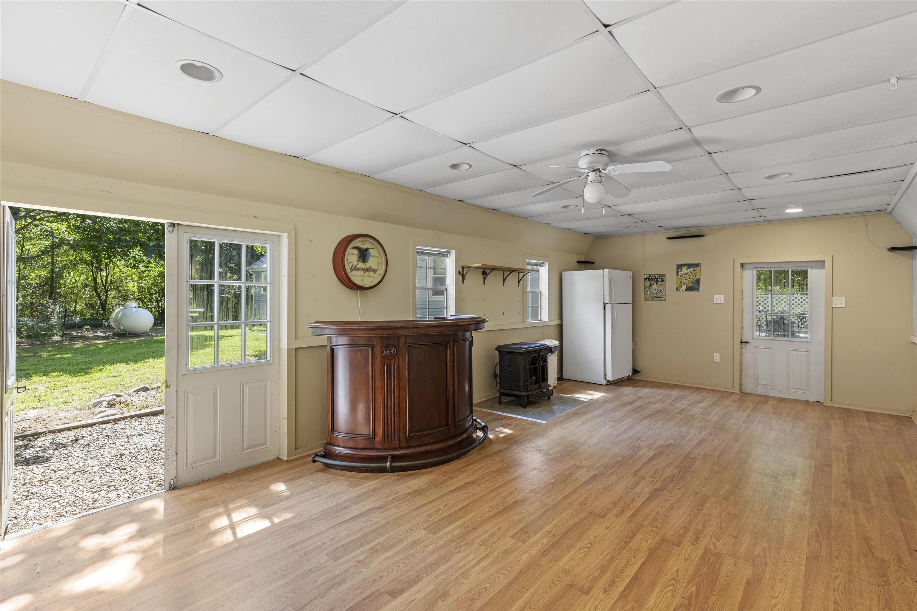 271 Hands Mill Road Belleplain, NJ 08270 - Photo 45 of 50 a view of an empty room with a window and wooden floor