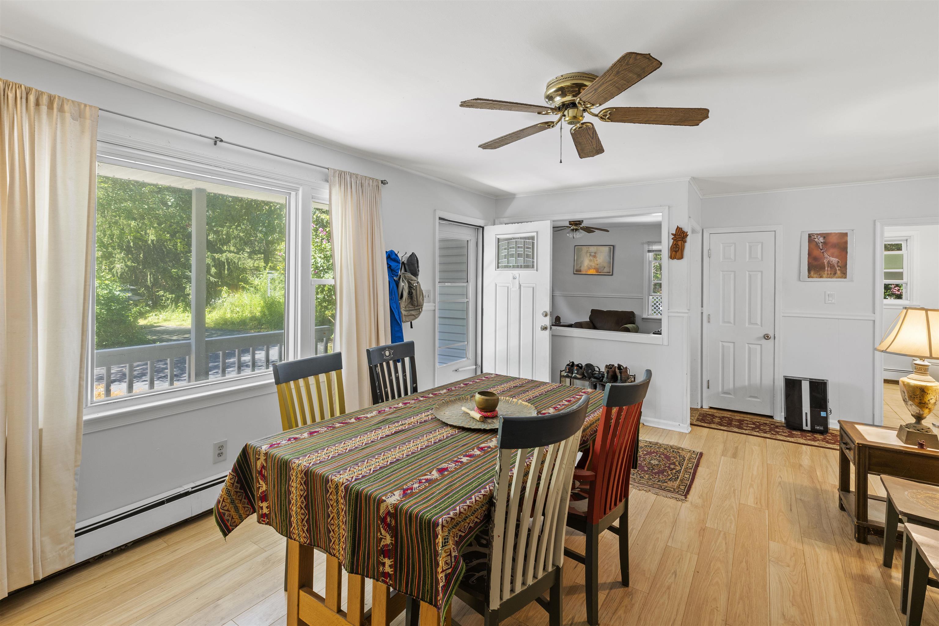 271 Hands Mill Road Belleplain, NJ 08270 - Photo 9 of 50 a view of a dining room with furniture window and wooden floor