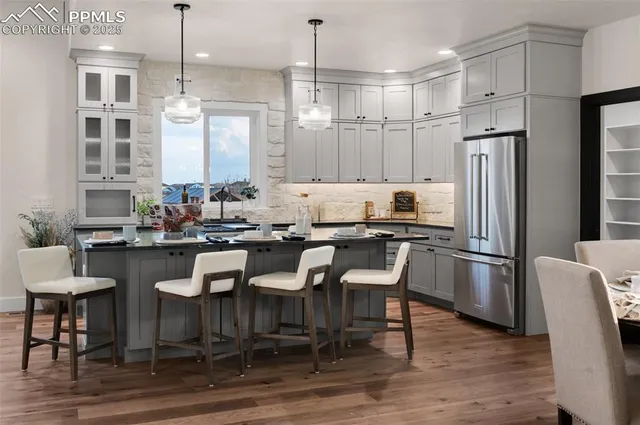 a living room with furniture fireplace and flat screen tv