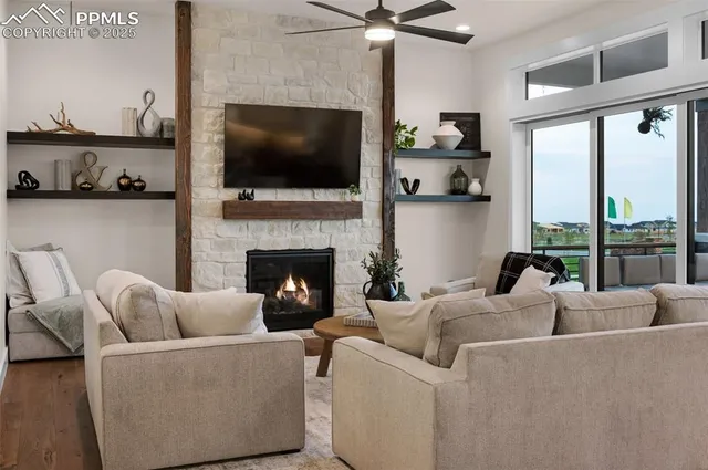 a living room with furniture and a window