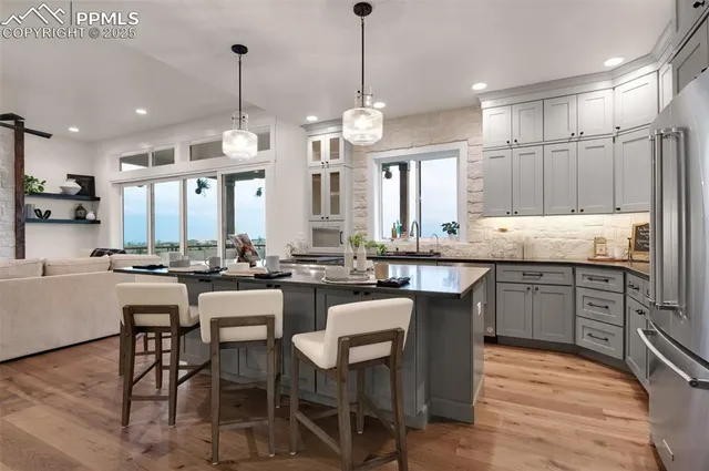 a living room with furniture fireplace and flat screen tv
