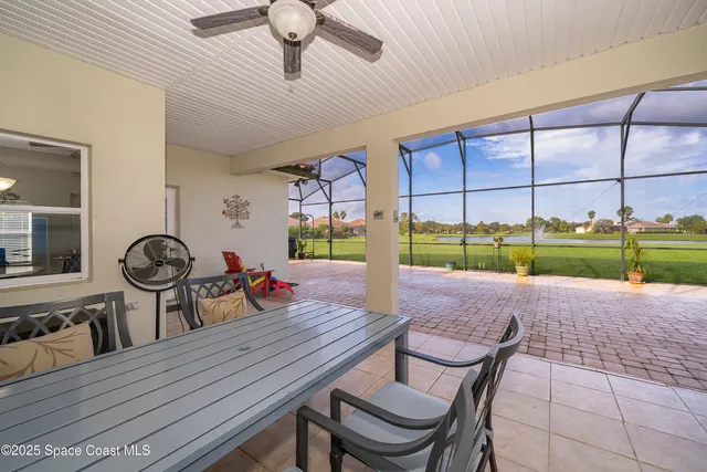 a view of a backyard with porch