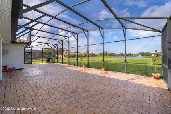 a view of a backyard with porch
