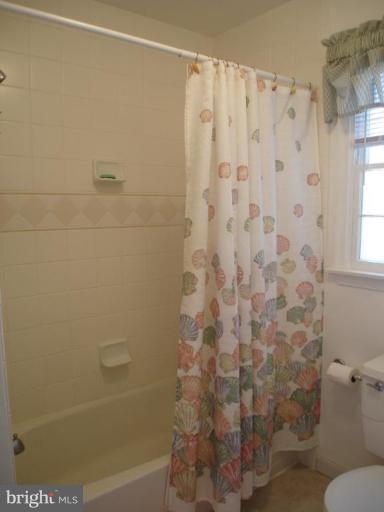 1912 Wilson Road White Hall, MD 21161 - Photo 14 of 29 a bathroom with a shower curtain