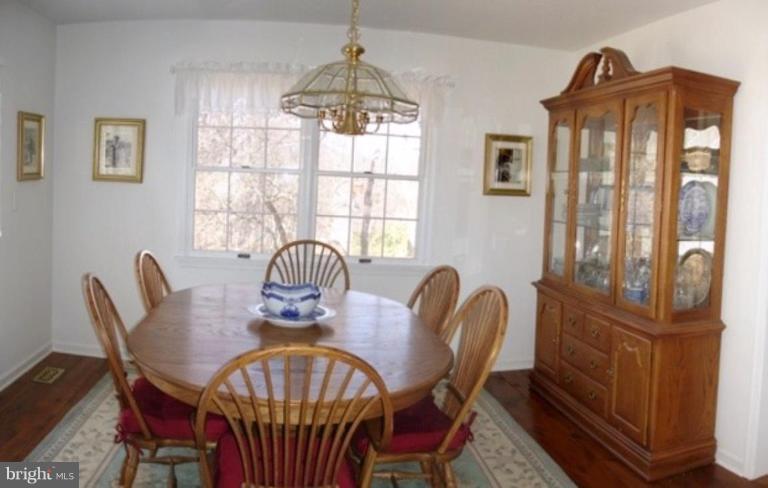 1912 Wilson Road White Hall, MD 21161 - Photo 7 of 29 a view of a dining room with furniture window and outside view