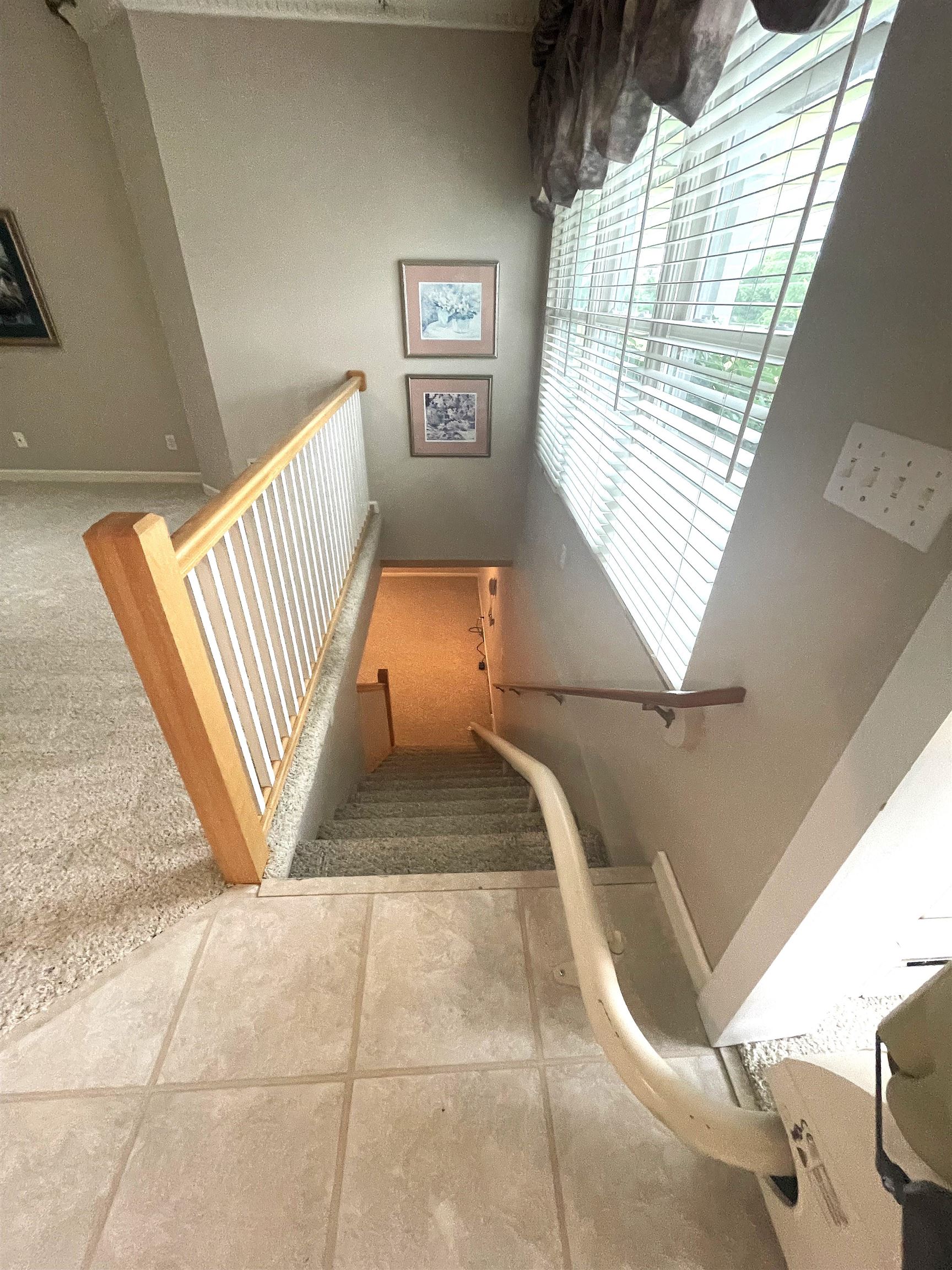 950 Iowa Street Alma, MI 48801 - Photo 52 of 72 Chair lift to lower level ADA compliant Can be removed by seller if you don't want