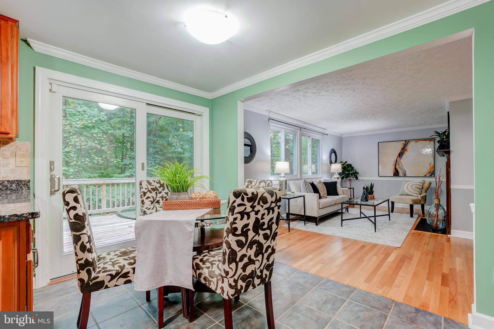 8843 Woodlawn Way Springfield, VA 22153 - Photo 17 of 45 Kitchen is open to family room with fireplace