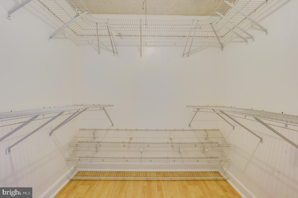 8843 Woodlawn Way Springfield, VA 22153 - Photo 25 of 45 Walk-in closet in primary bedroom