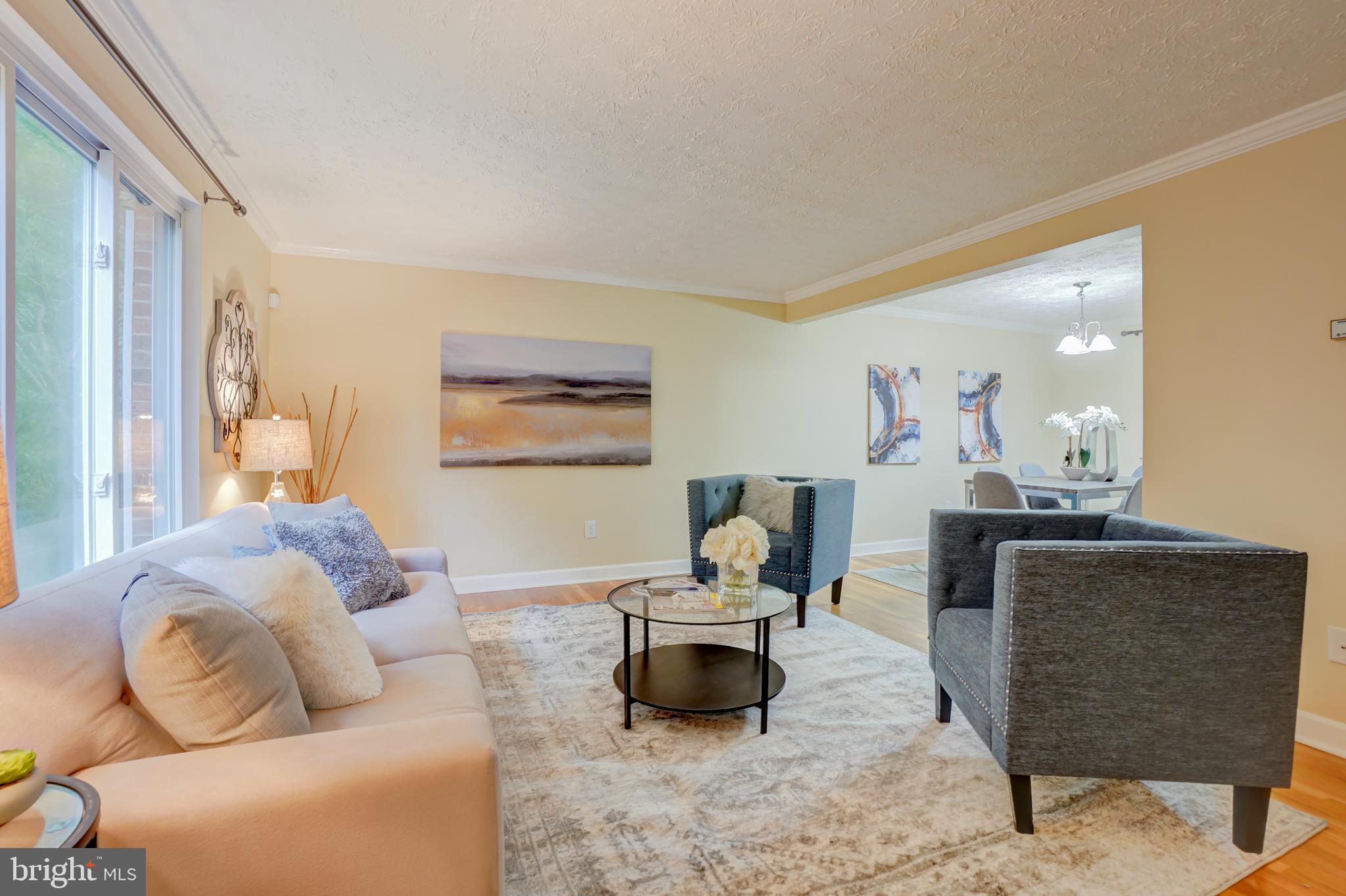 8843 Woodlawn Way Springfield, VA 22153 - Photo 7 of 45 Front Living room is large and inviting