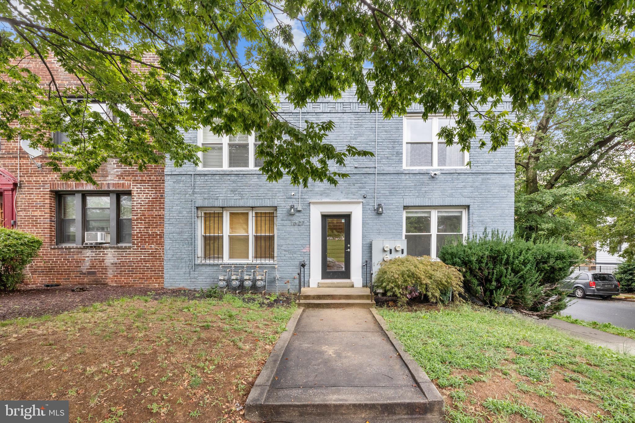 1627 Holbrook Street Northeast, Unit 2 Washington, DC 20002 - Photo 24 of 24 a front view of a house with garden