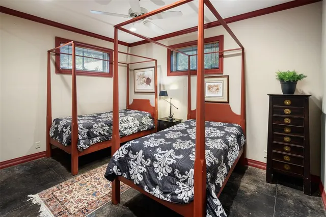 a bed room with a bed and a window