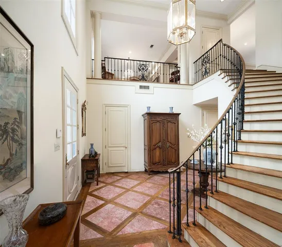 a view of a livingroom with furniture and hardwood floor