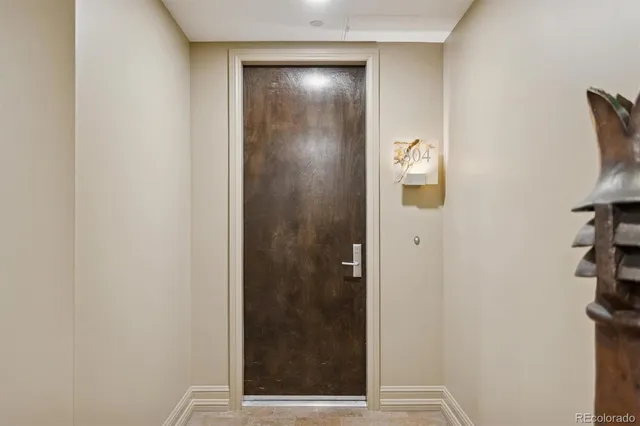 a view of living room with furniture and wooden floor