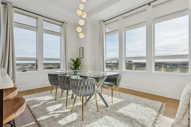 a kitchen with a table and chairs in it