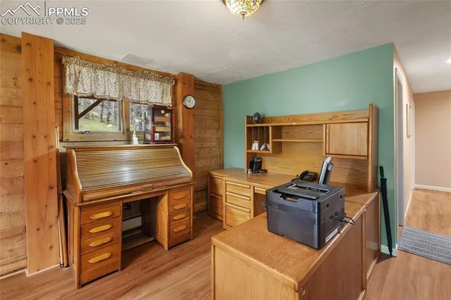 a kitchen with stainless steel appliances granite countertop a stove and a refrigerator