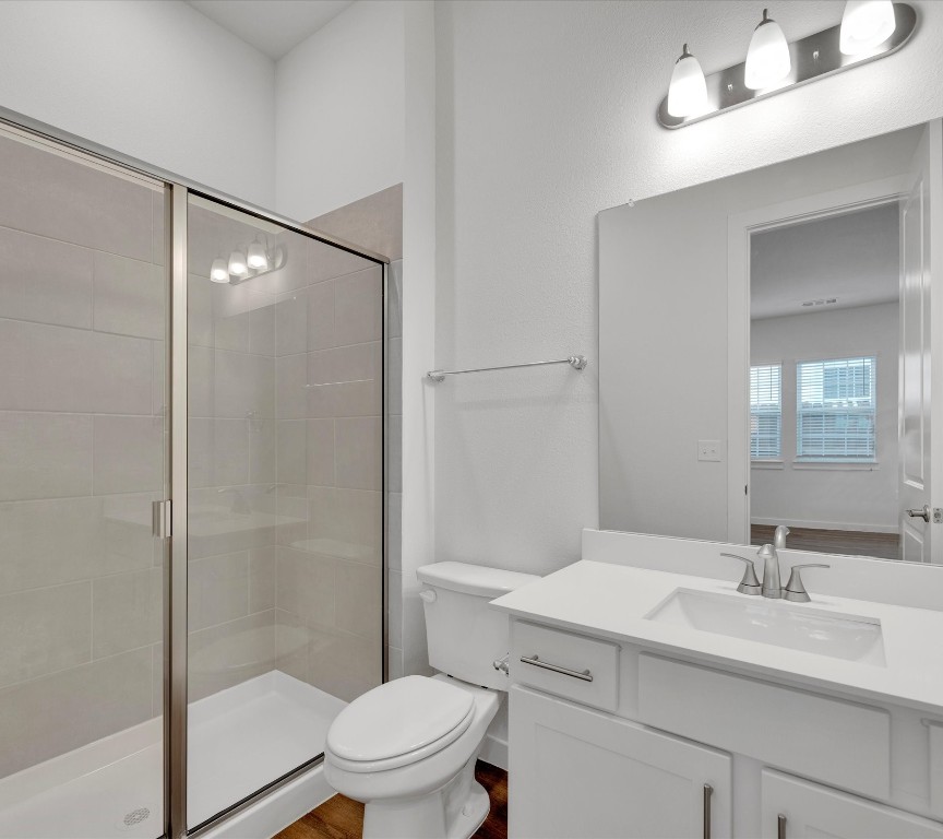 2703-406 Rockhill Road McKinney, TX 75072 - Photo 11 of 14 a bathroom with a sink toilet and shower