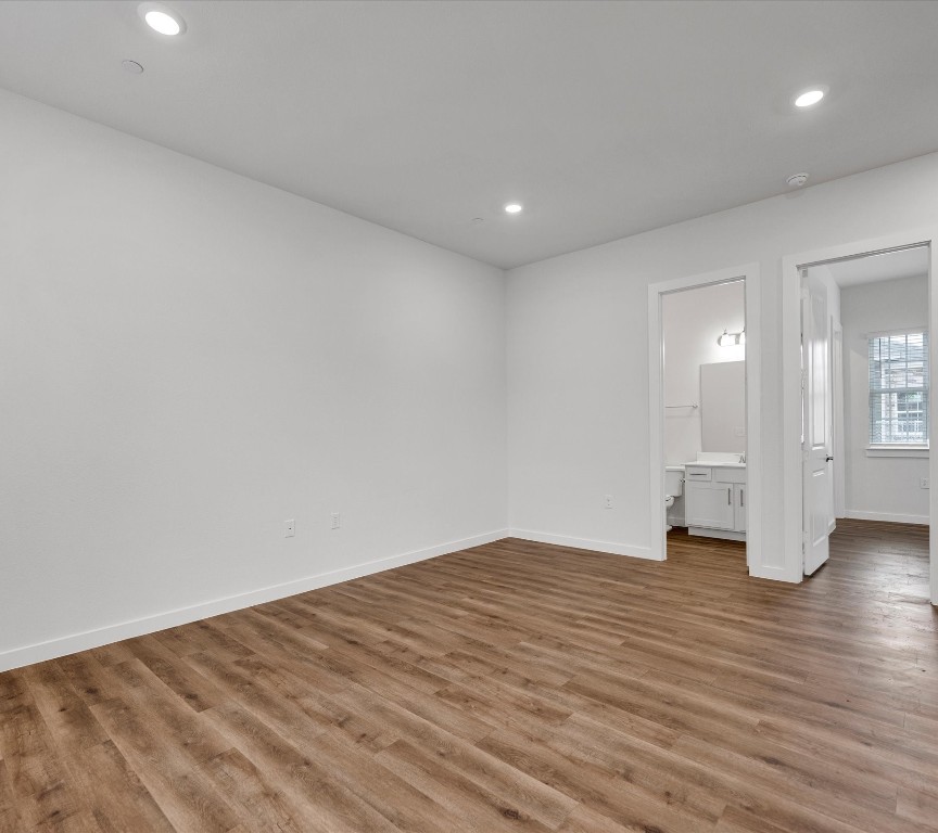 2703-406 Rockhill Road McKinney, TX 75072 - Photo 10 of 14 a view of empty room with wooden floor
