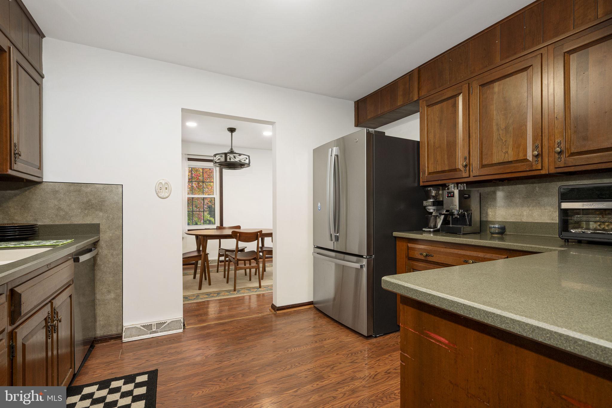 46 Green Acre Road Lititz, PA 17543 - Photo 12 of 44 a kitchen with wooden cabinets and stainless steel appliances