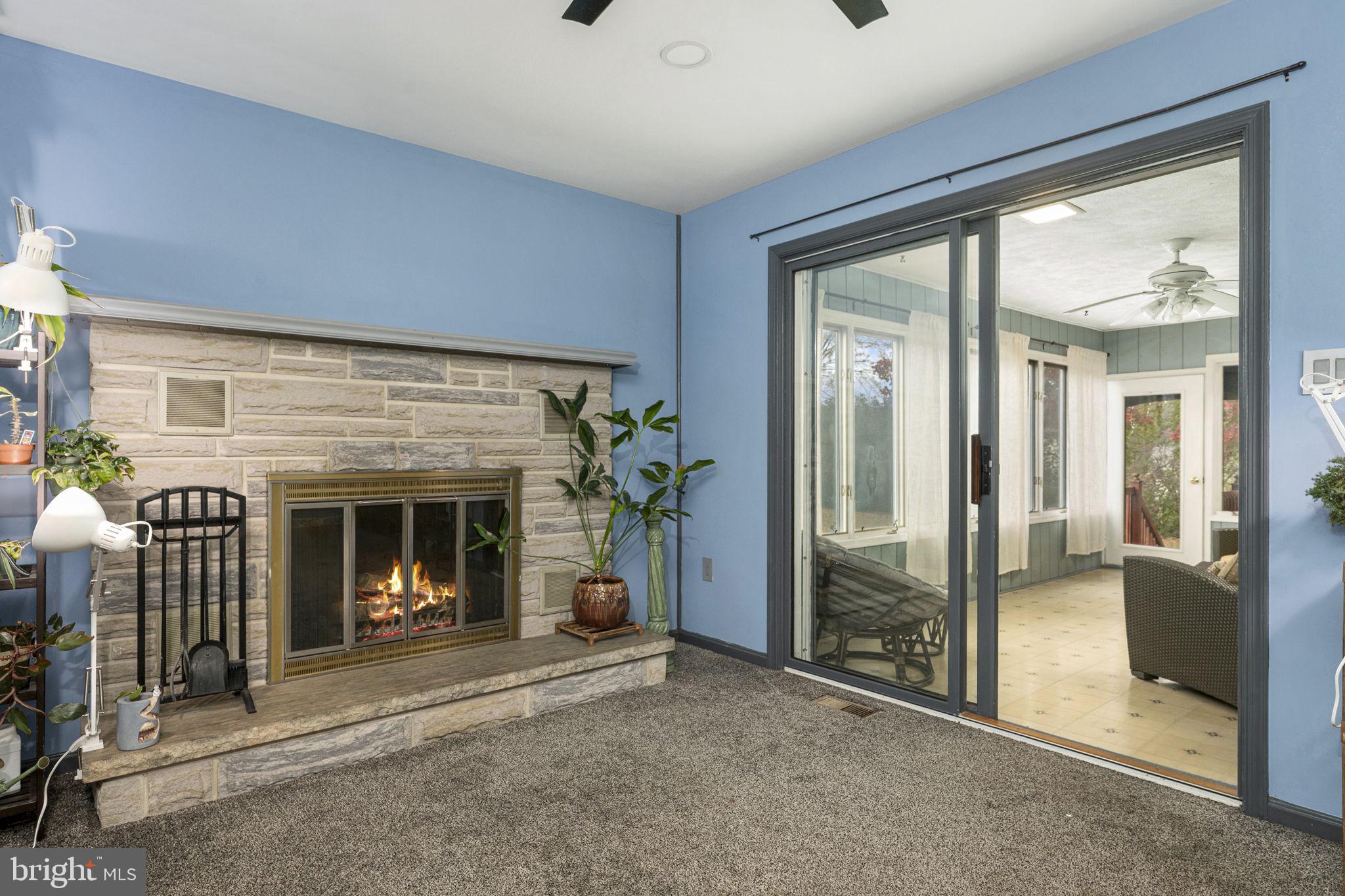 46 Green Acre Road Lititz, PA 17543 - Photo 7 of 44 a view of a livingroom with a fireplace and a couch