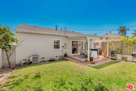a view of a backyard with a patio