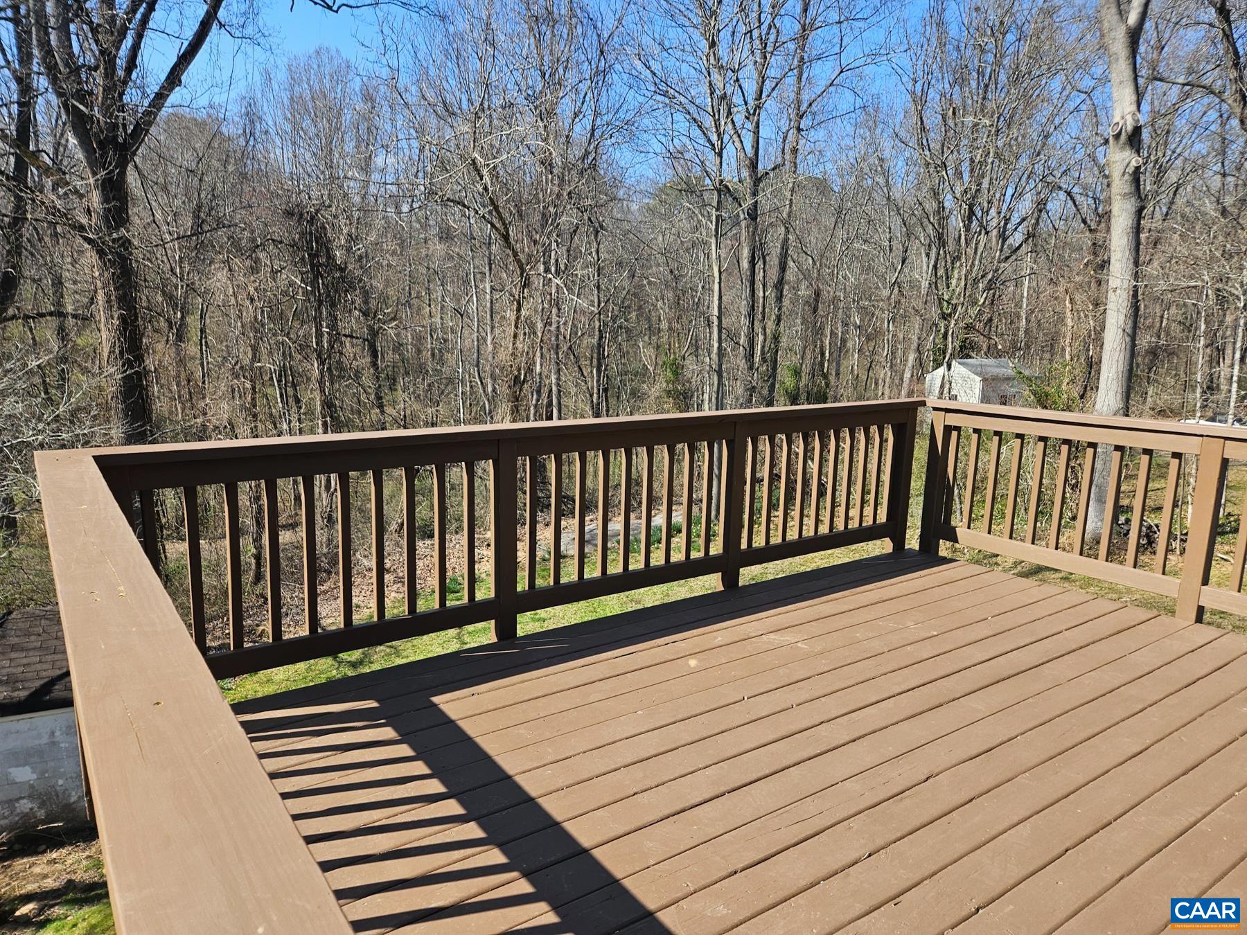 150 Buckingham Circle Charlottesville, VA 22903 - Photo 24 of 27 a balcony with wooden floor and fence
