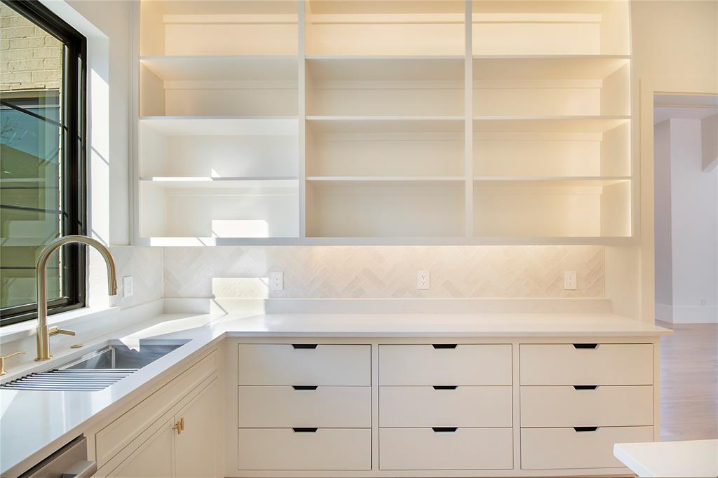 4222 Middleton Road Dallas, TX 75229 - Photo 16 of 40 a kitchen with cabinets appliances and a sink