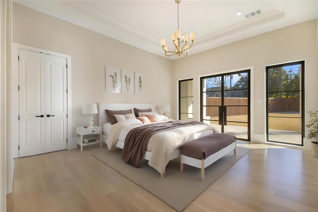 4222 Middleton Road Dallas, TX 75229 - Photo 20 of 40 a spacious bedroom with a bed and a window