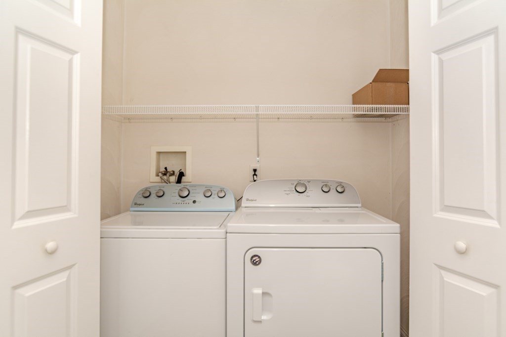 53 Baldwin Road, Unit 403 Billerica, MA 01821 - Photo 21 of 40 a utility room with dryer and washer
