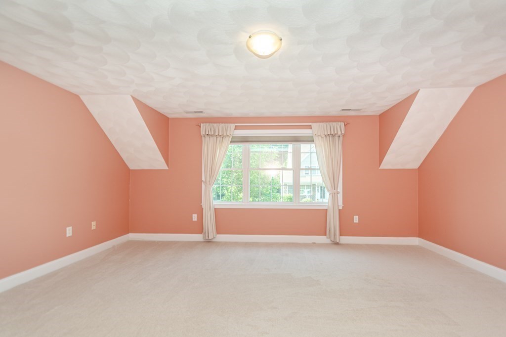 53 Baldwin Road, Unit 403 Billerica, MA 01821 - Photo 30 of 40 an empty room with windows