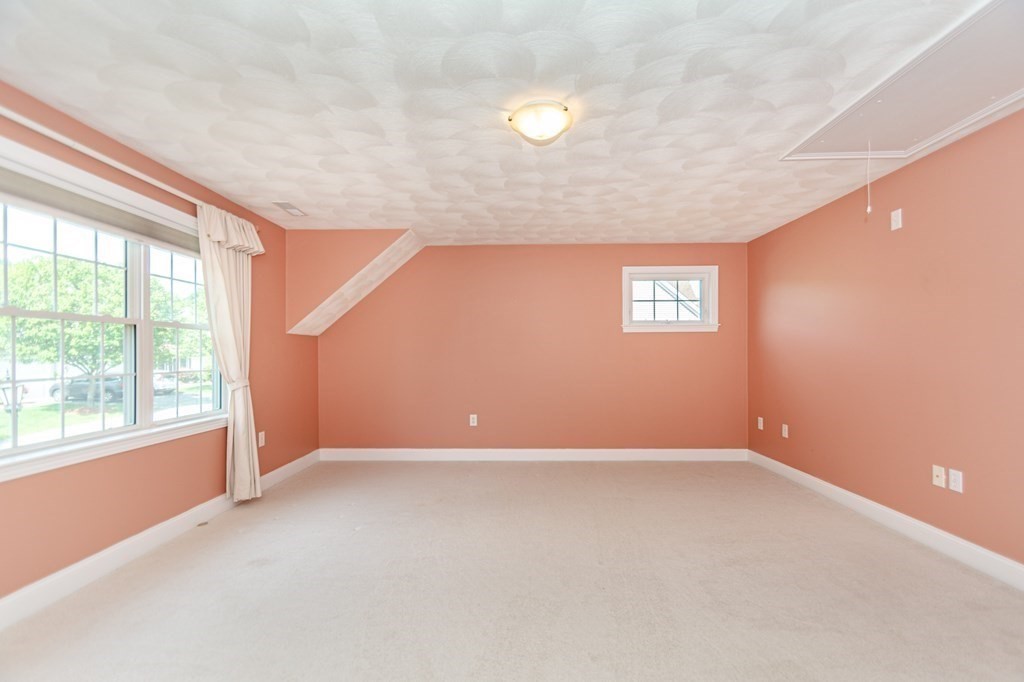 53 Baldwin Road, Unit 403 Billerica, MA 01821 - Photo 31 of 40 an empty room with windows
